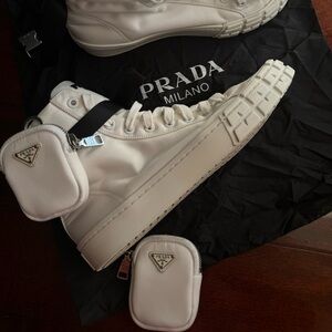 Prada
Re-Nylon pouch detail high-top sneakers Size 42-43       US 9 1/2